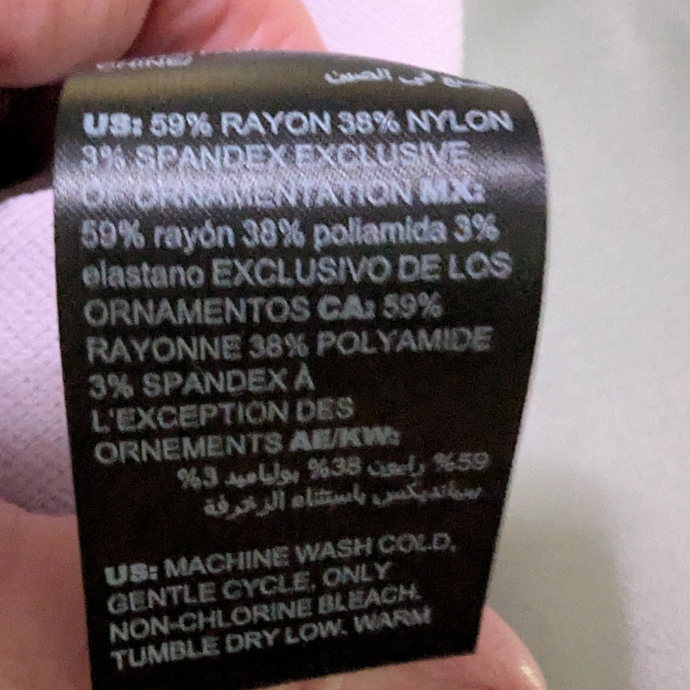 Pink Sleeveless Peplum Top - Picture 2 of 3